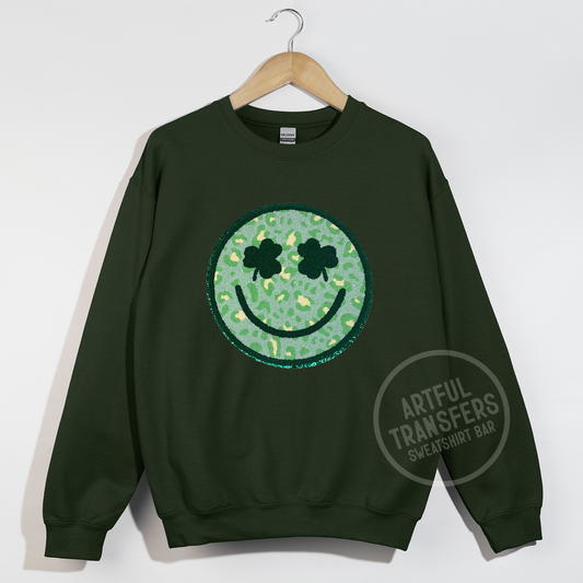 Clover-Eyed Smiley Chenille Patch on Forest Green Crewneck Sweatshirt