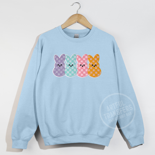 Four Checkered Bunnies Chenille Patch on Light Blue Crewneck Sweatshirt