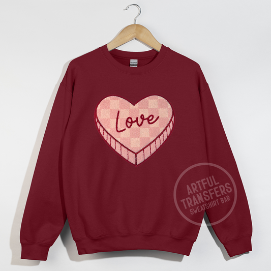 Pink Checkered Love Candy Heart Chenille Patch on Garnet Crewneck Sweatshirt