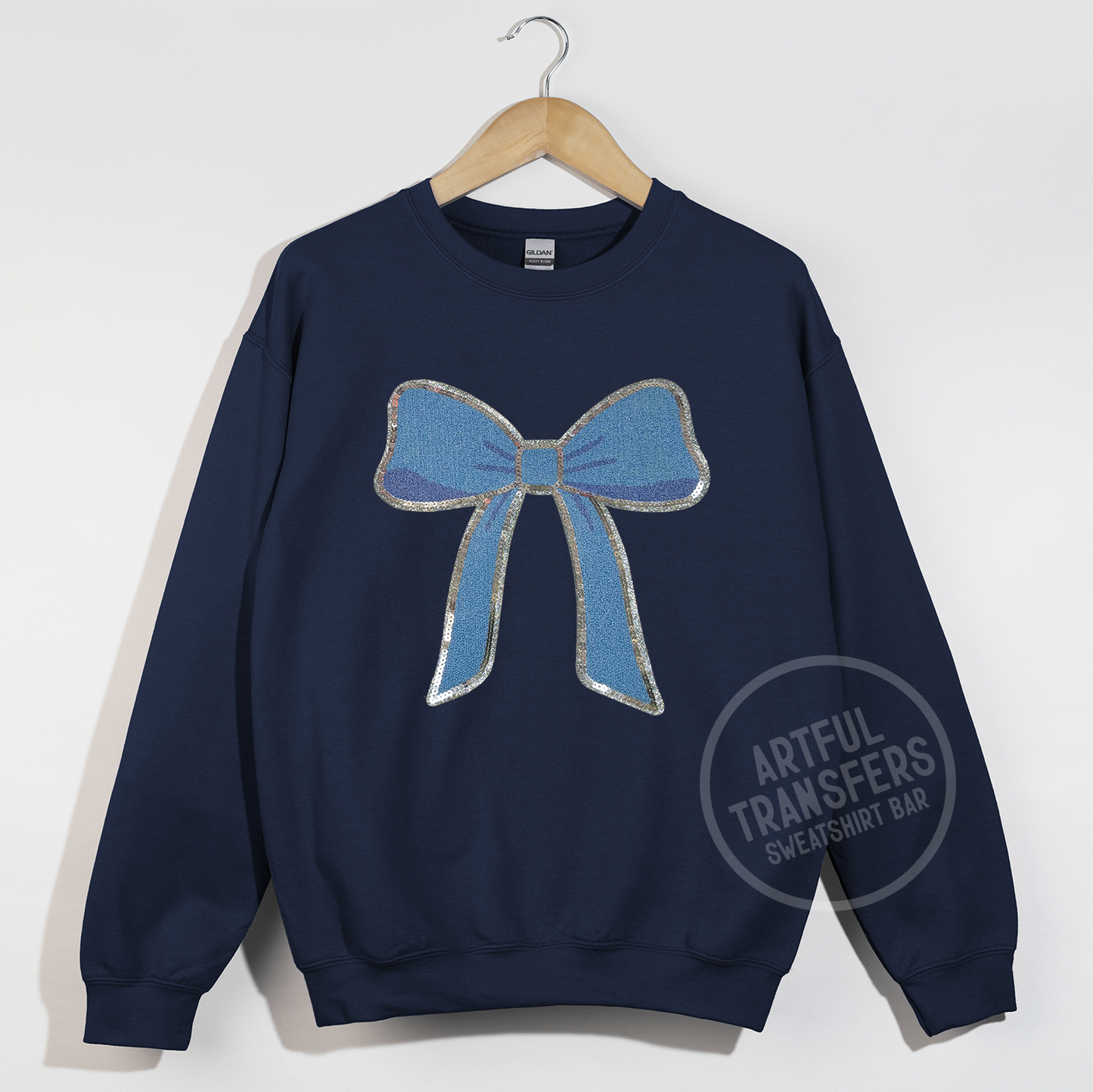 The Blue Bow Chenille Patch on Navy Crewneck Sweatshirt